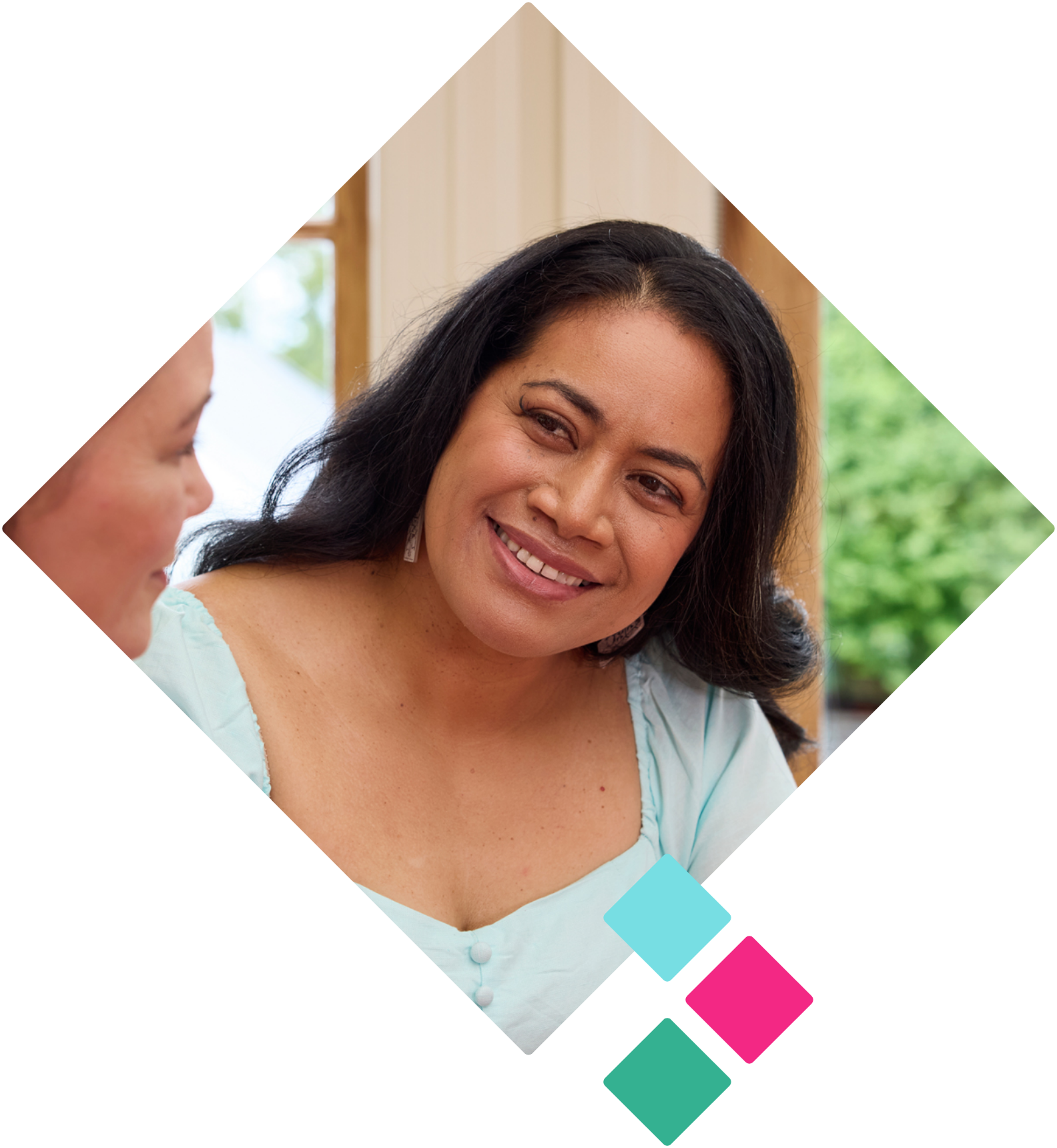 One Wahine (women) sewing a quilt